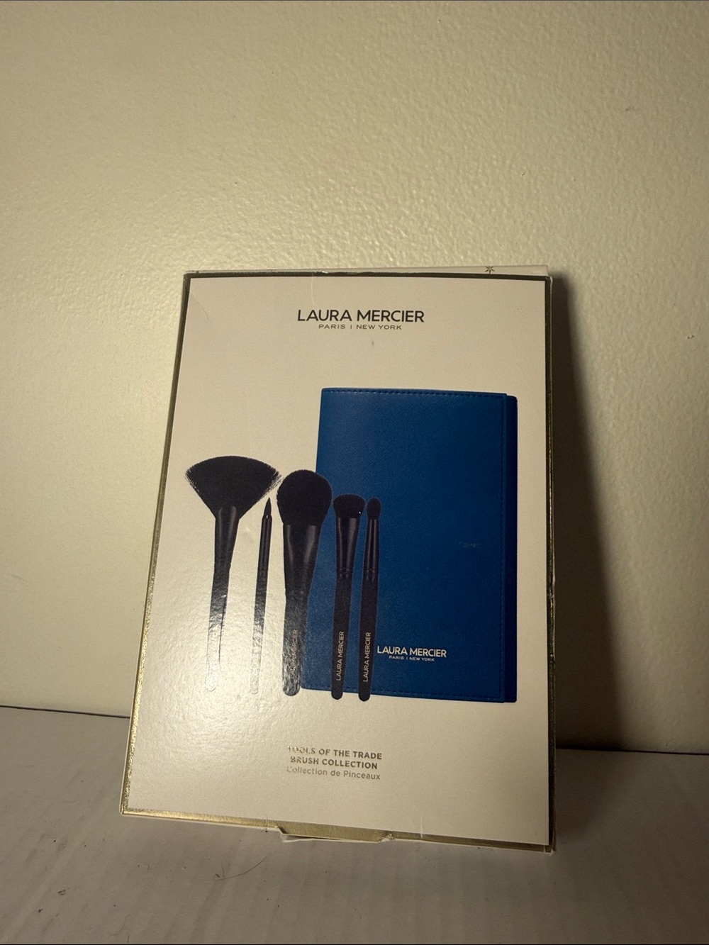 laura mercier black brushes with blue folio
